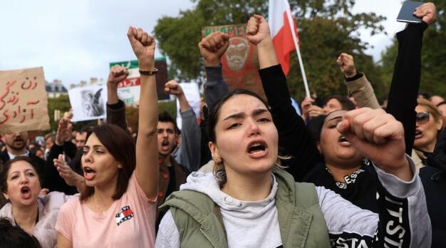 French march in Paris to rally support for women in Iran