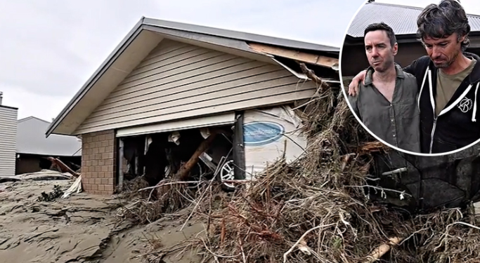 Brothers break down in tears, embrace in aftermath of flood destruction