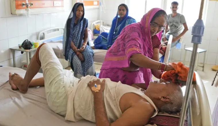 Days of sweltering heat, power cuts in northern India overwhelm hospitals as death toll climbs