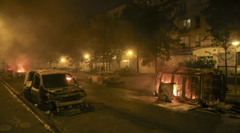 French suburbs are burning. How a teen’s killing is focusing anger over police tactics