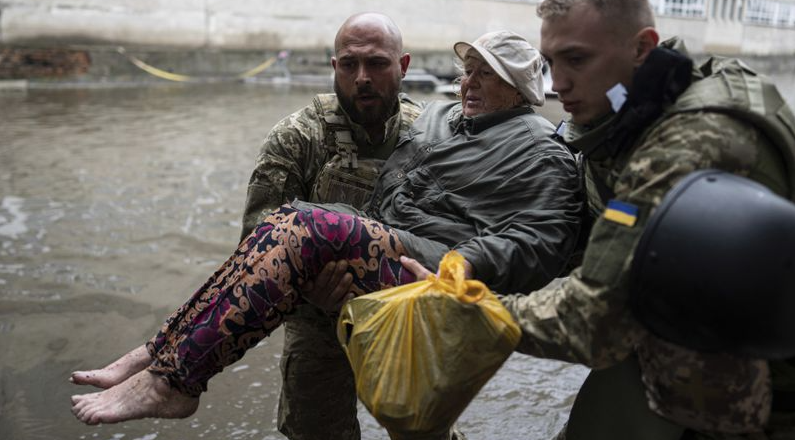 Ukraine recaptures village in counteroffensive as Russian forces fire on civilians fleeing flood