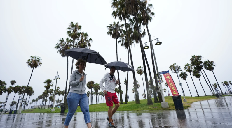 Rain from Tropical Storm Hilary lashes California and Mexico, swamping roads and trapping cars