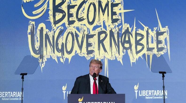 Trump booed at Libertarian convention as he asks crowd to ‘nominate me or at least vote for me’